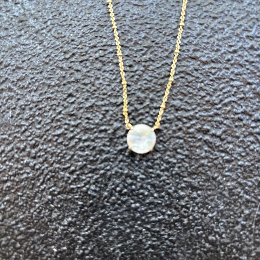3 Kendra Scott necklaces